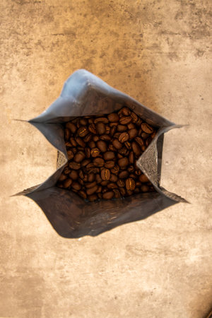 Coffee beans bag on grey backgroundの写真素材