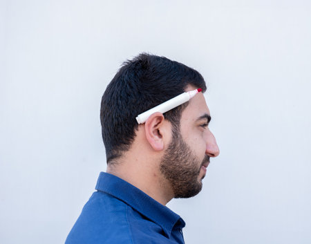 young male holding pen teaching and describing as teacher for student on white background