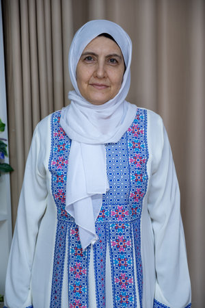 portrait for women wearing traditional clothes indoors with smileの写真素材