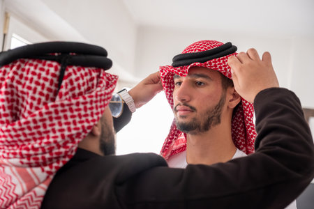 arab support each other even in wearsの写真素材