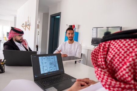 Arab males in meeting during work with copy spaceの写真素材