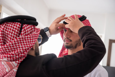 arab support each other even in wearsの写真素材