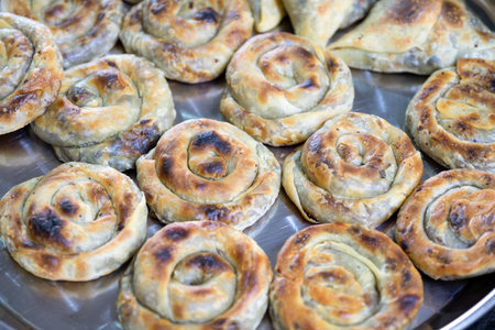 Vintage Oven Delights: Delectable Stuffed Pastries Await Baking in the Old Oven, A Culinary...