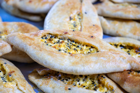 Vintage Oven Delights: Delectable Stuffed Pastries Await Baking in the Old Oven, A Culinary Traditionの写真素材