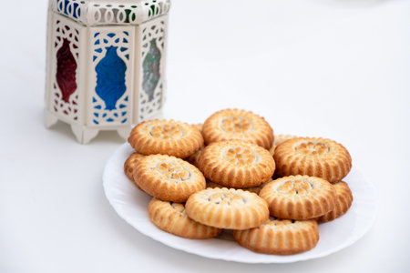 dates kahk eid sweets and fanos on white isolated background