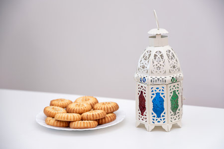 dates kahk eid sweets and fanos on white isolated backgroundの写真素材