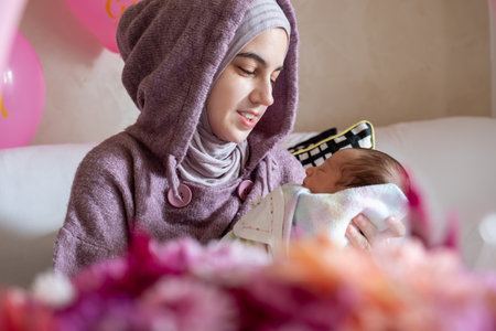 baby with his mom celebrating the new life started since the day of born