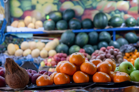 Bazaar selling summer fruits in shop showing plenty types of fruits and variations of choicesの写真素材