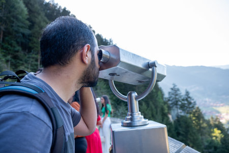 male using binocular during his journeyの写真素材