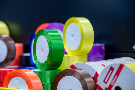 ribbon rolls on store shelf for sale to be used for DIY and gift wrappingの写真素材