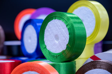 ribbon rolls on store shelf for sale to be used for DIY and gift wrappingの写真素材