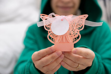 A Celebration of Motherhood and Tradition Through Handmade Artwork and Origami Packaging for Baby...