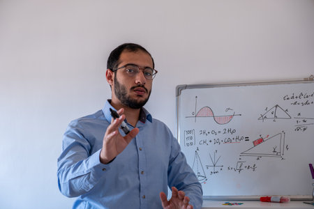 Man teaching math online from home