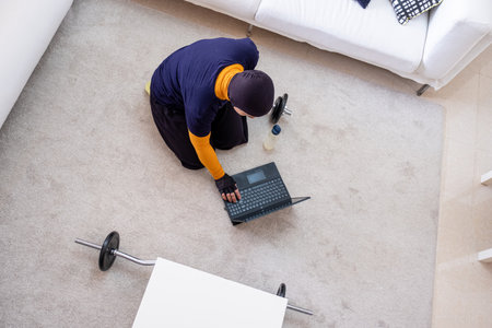 muslim woman doing exercises in homeの写真素材