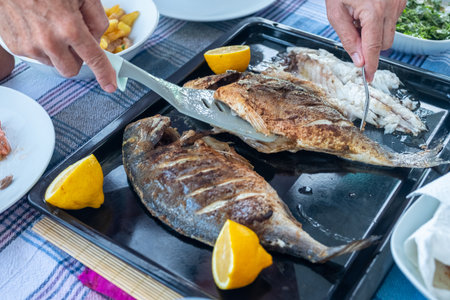 Family gathering to eat fish together