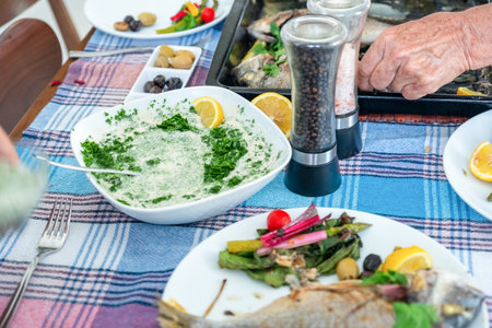 Family gathering to eat fish together