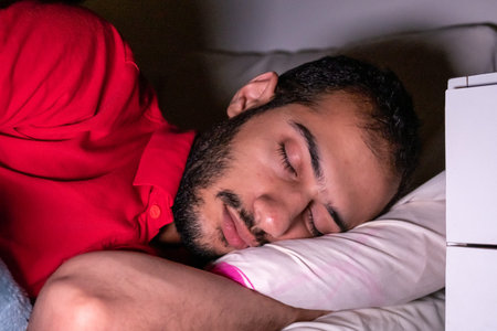 Muslim man having a nap in the bed room