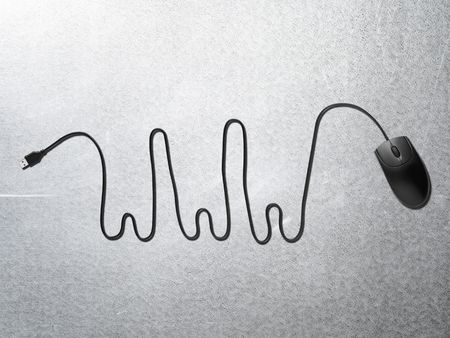 wire of a computer mouse forming wwwの写真素材