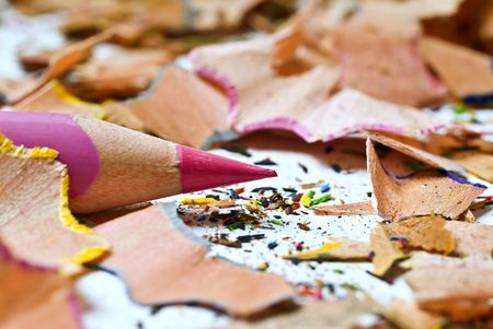 pink pencil and multicolored shavings の写真素材