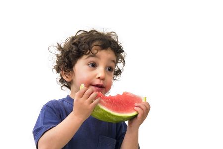 boy and watermelon isolated on whiteの写真素材