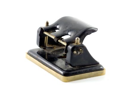 retro office puncher isolated on whiteの写真素材