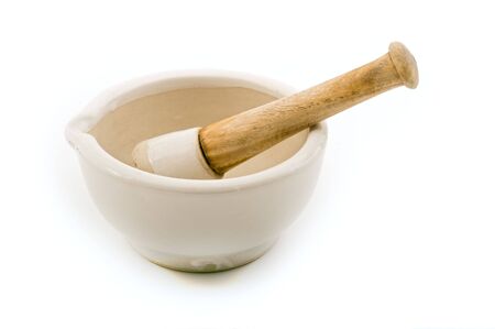 ceramic mortar and pestle isolated on whiteの写真素材