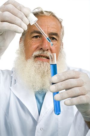 Mature scientist in laboratory holiding pipette and test tube with blue liquid isolated on whiteの写真素材