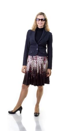 Smiling European business women in her 40's wearing sunglasses isolated on whiteの写真素材