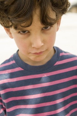 portait of an unhappy young boyの写真素材