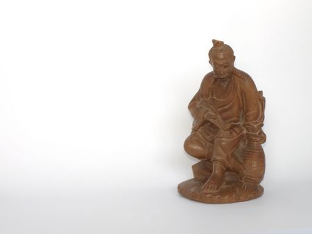 Old wooden chinese guruの写真素材