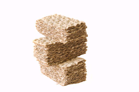 Stack of crackers isolated on a white backgroundの写真素材