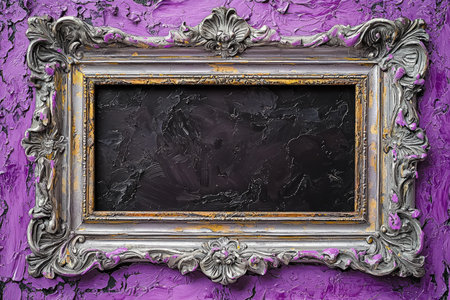 A detailed close up shot of an antique silver frame with ornate details set against a background of textured purple paint.の素材