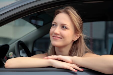Woman Sitting In Car