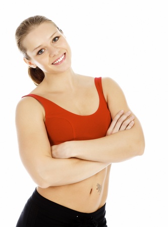 Smiling sports woman isolated on with background の写真素材