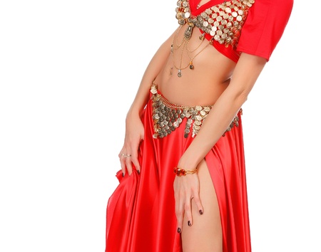 Belly dancer in red dress, isolated on a white backgroundの写真素材