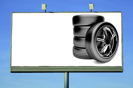 Street billboard with tires and a space for your textの写真素材