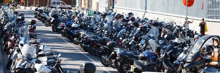 Bikes at the parking on one of the Barcelona's streetsのeditorial素材