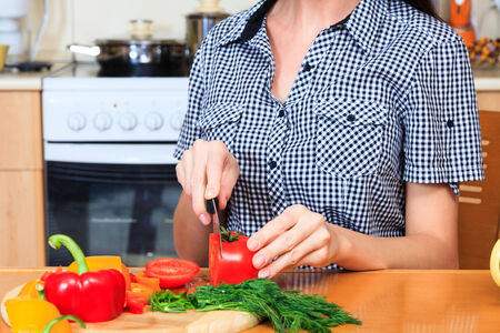 Woman prepares a salad
の写真素材
