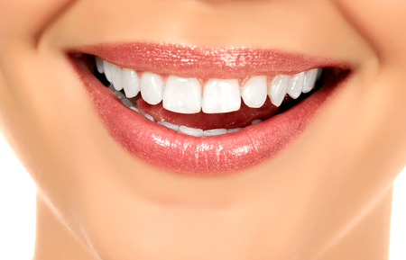 Young smiling woman, white background, copyspace
の写真素材