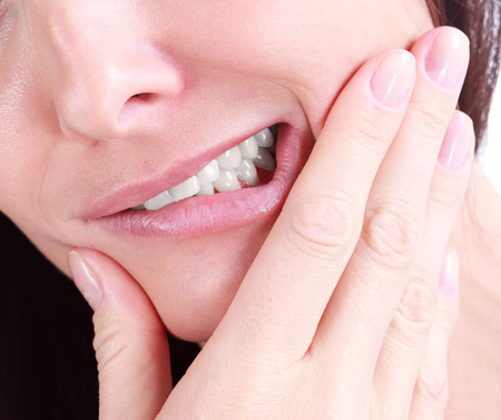 Woman with a tooth pain Woman with a tooth pain