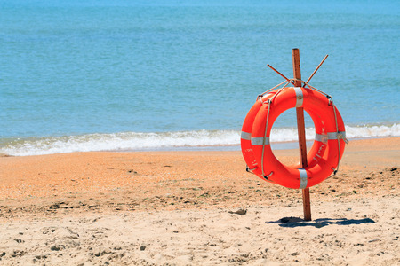 lifebuoy on a beachの写真素材