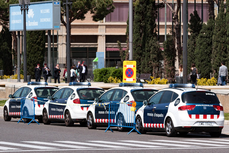 Barcelona, Spain - APRIL 16, 2013: Row of police cars in the town of Barcelona. The Mossos Esquadra is a police force that operates only in Cataloniaのeditorial素材