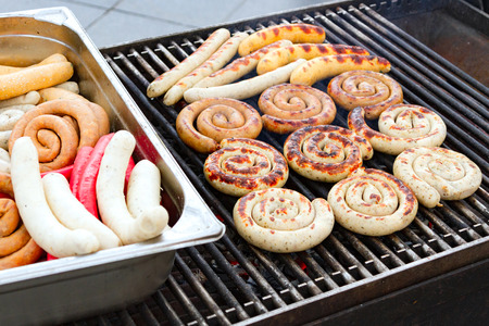 Closeup shot of sausages on the grillの写真素材