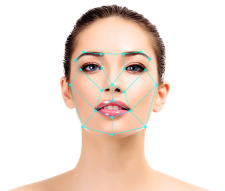 Closeup shot of woman with scnanning grid on the face.  Security, facial ID recognition concept, isolated on white backgroundの写真素材