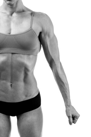 Muscular lady on a white background, isolatedの写真素材