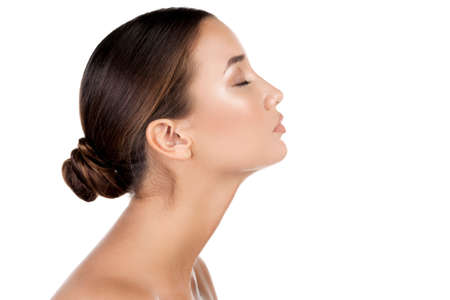 Pretty woman with long neck, isolated on white background