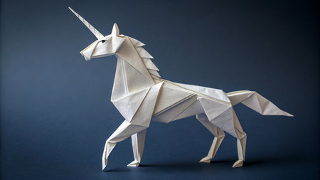 Paper origami unicorn on a dark background. Animal origami.の素材