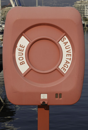 Lifebuoy on the pier of a marina, the object cut out (Lifebuoy is Lifebuoy, written in French)の写真素材