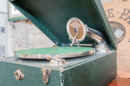 Portable record player vinyl in green suitcaseの写真素材