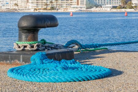 Mooring bollard for large yacht in the port Gallice in Juan les Pins French Riviera Provence France, with its mooring well posedの写真素材